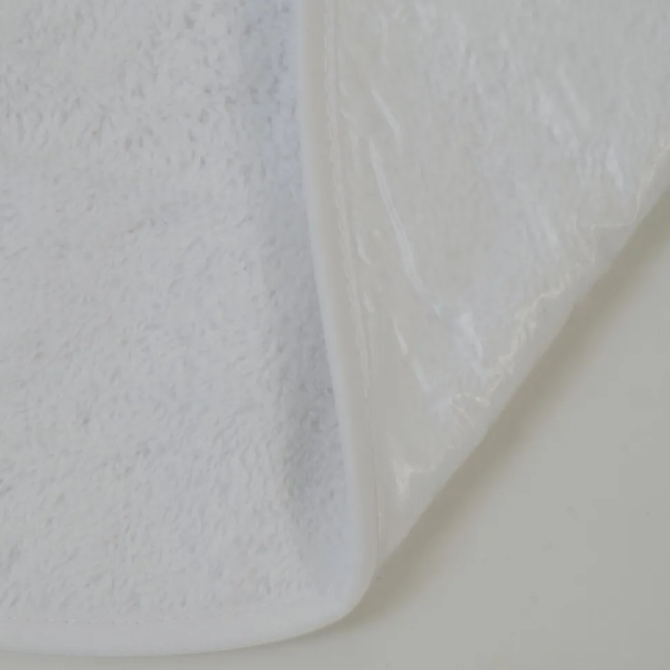 Babero rizo plastico con goma blanco