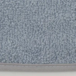 Babero rizo plastico con goma azul hielo