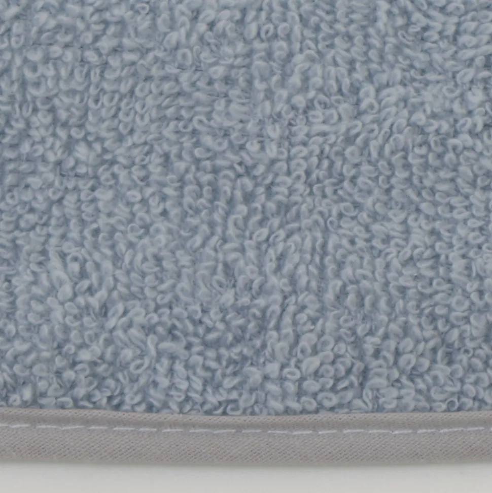 Babero rizo plastico con goma azul hielo