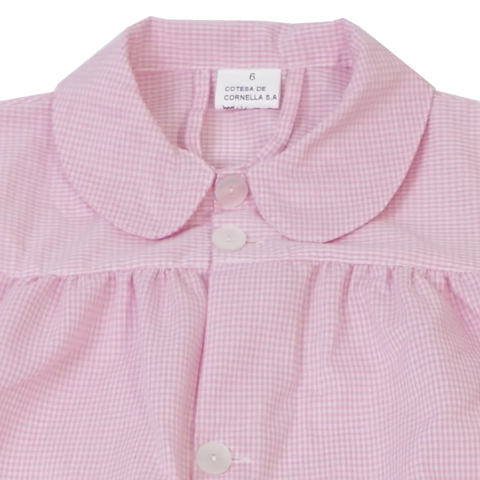 Bata escolar con botones rosa
